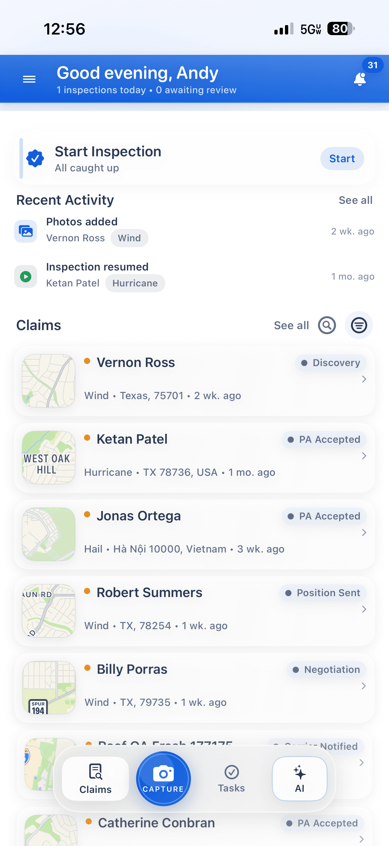 The claimOS iOS app showing the claims dashboard